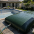 Storing water in a bladder during a pool repair 70x70